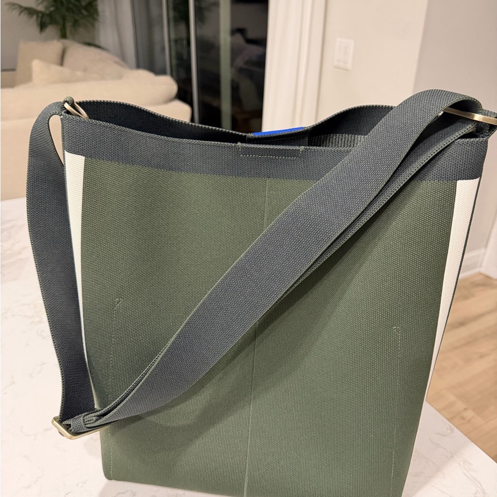 Rothy's Bucket Bag in Dark Green with super cute striped side